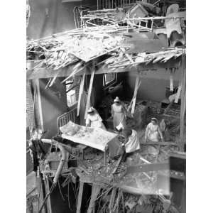 Nurses are Seen Clearing Debris from One of the Wards in St. Peters 