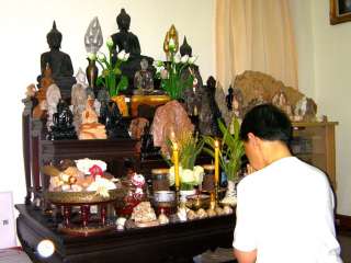 Paying respect to the Lord Buddha in my Buddhas room (A deva ball 