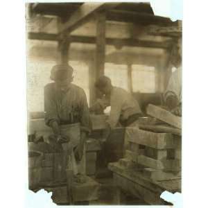  Young boy polishing marble in Vermont Marble Co., Centre Rutland, Vt 