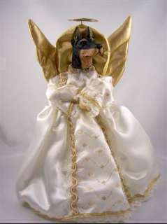 these angelic christmas tree toppers are made of silk clothing with 