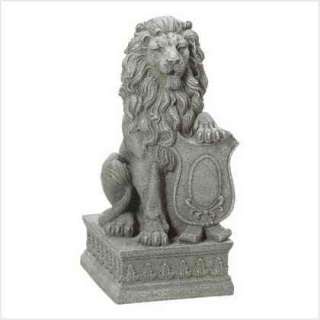 38624 statue lion guardian with his mighty paw placed atop