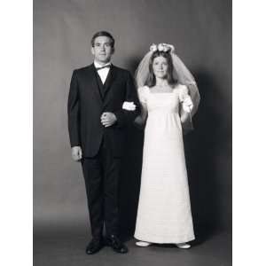  Full Length Portrait of Groom Arm In Arm With Bride With 