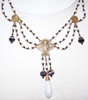 The necklace is 21 1/2 long around neck and pendant   over 4 1/4 