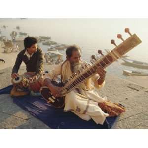  Musicians Playing the Sitar and Tabla on the Banks of the 