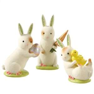   Colored Bunny Figurines Holding Egg, Carrot, and Duck