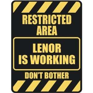   RESTRICTED AREA LENOR IS WORKING  PARKING SIGN