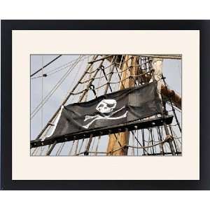 Skull and crossbones pirate flag on tall ship, Plymouth, Devon, UK 