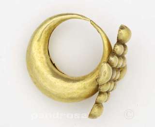   important tribal nose pin earring in gold Gujarat India 1930  