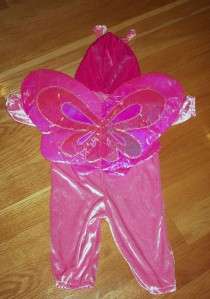   are large pink shiny butterfly wings super cute excellent condition