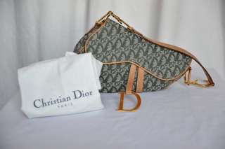   fun this christian dior iconic saddle bag is outfitted in logo denim
