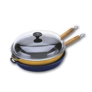  11 inch diameter cast iron frying pan with wooden handle. The pan 