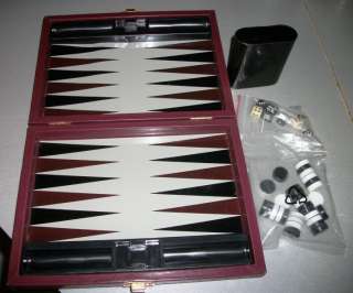 SMALL BACKGAMMON GAME IN A LEATHER CASE  
