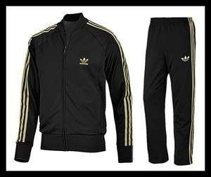 Adidas Trainingsanzug Herren schwarz/gold Superstar Firebird Jacke 