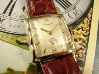   the photos below and good luck bidding on this stunning art deco watch