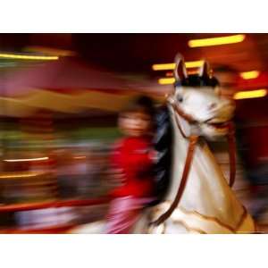  Child on Carousel at Grona Lund Amusement Park, Stockholm 