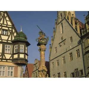 Buildings and Statue of St. George and the Dragon, Rothenburg, Germany 
