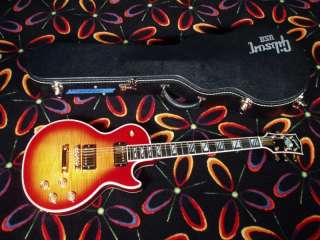   re looking at a 2006 gibson les paul supreme with a cherry sunburst