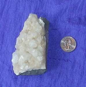 his is a beautiful natural zeolite specimen. Pictures show views of 