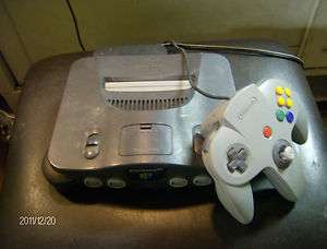 NINTENDO 64. SYSTEM. CONTROLLERS. CORDS. VIDEO GAMES. NINTENDO COMPANY 